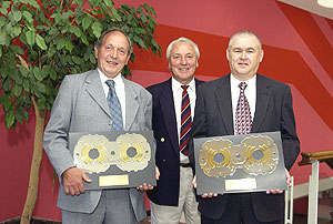 LHC project leader Lyn Evans with the recipients of the 'Golden Hadron' awards