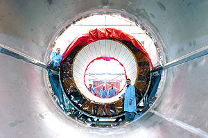 Insertion of the first half-barrel of the ATLAS electromagnetic calorimeter into its cryostat