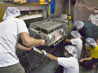 LHCb installs its precision silicon detector, the VELO